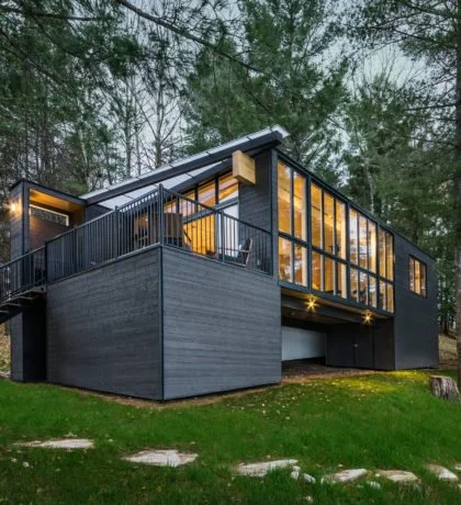 Angled-view of exterior of CLT Cottage from lake