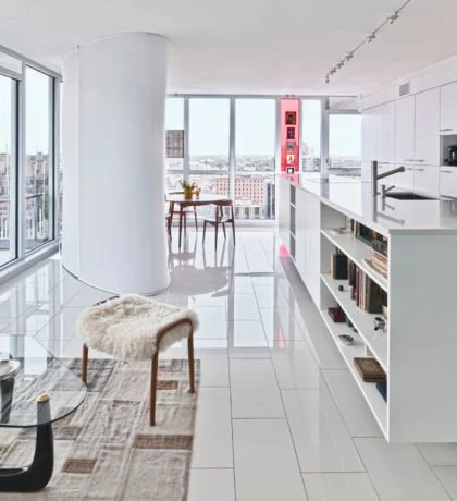 Redeveloper Apartment living area and kitchen with view of balcony