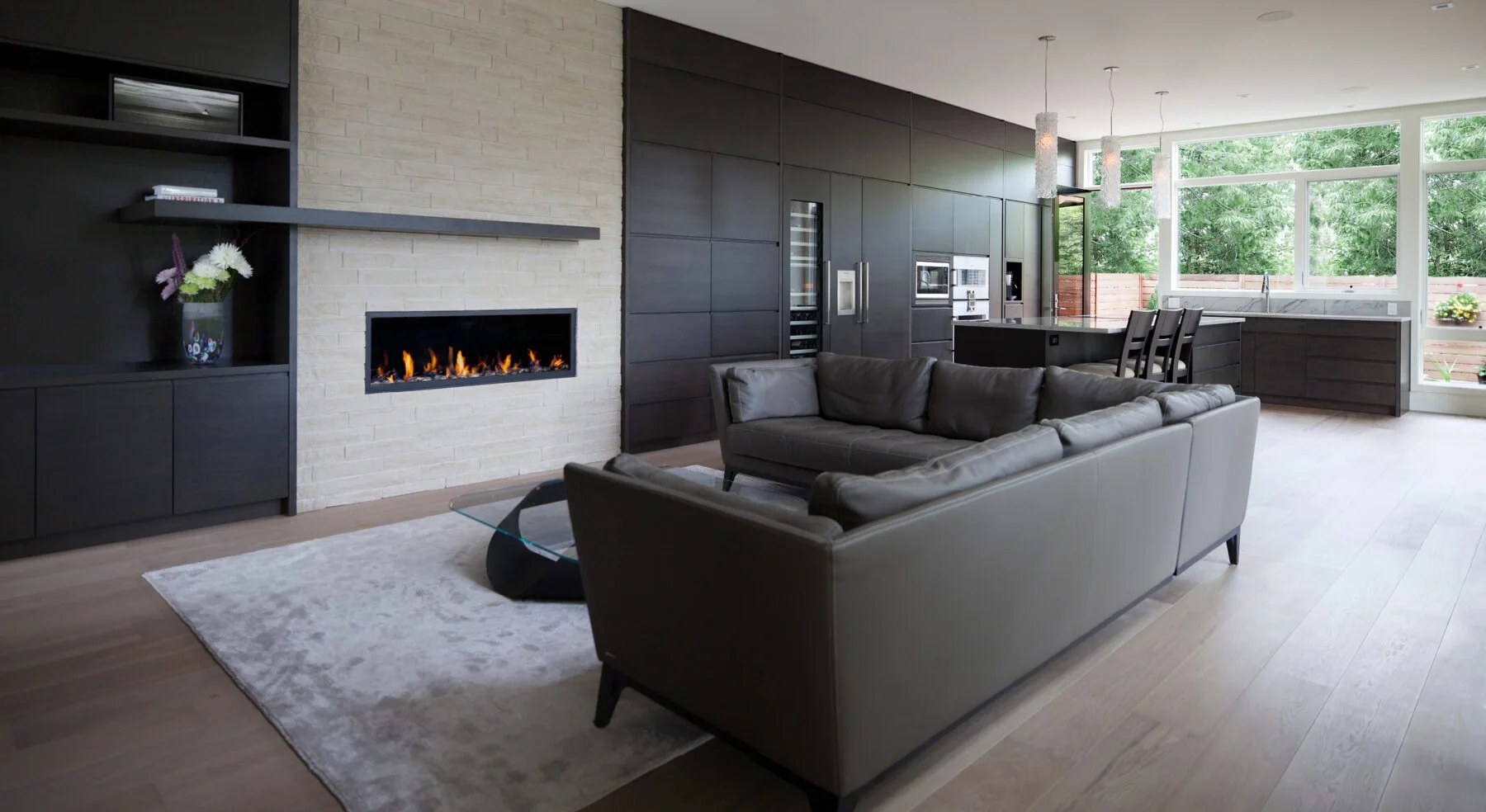 View of Westboro Home living area fire place and kitchen