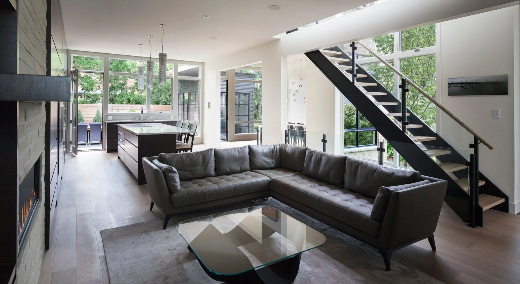 View of Westboro Home stairs, living area and kitchen