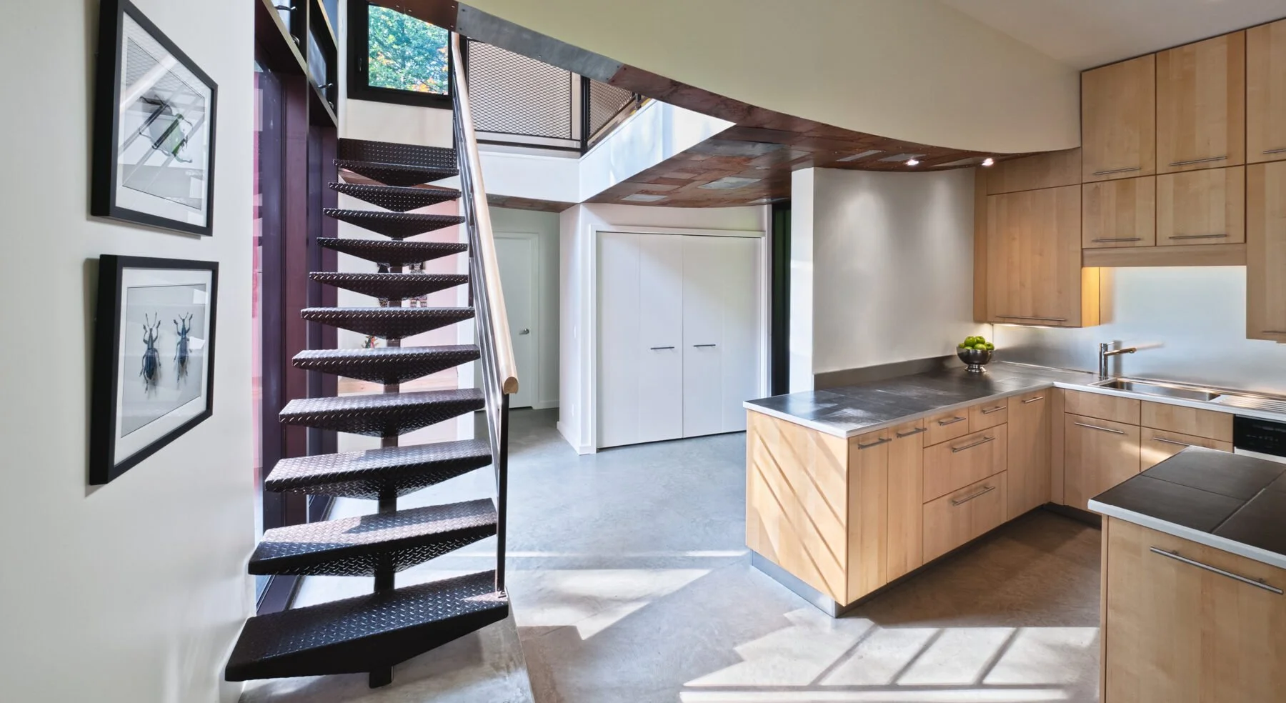 View of Hill-Maheux Cottage kitchen and staircase