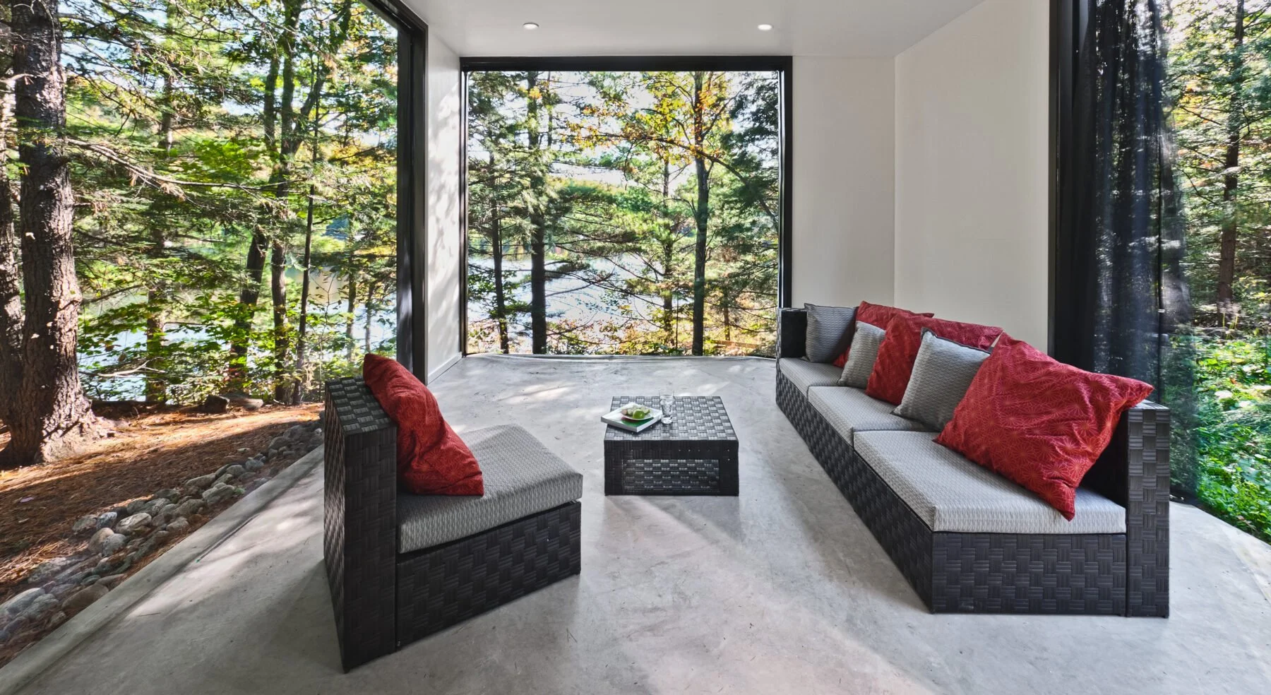 Hill-Maheux Cottage porch with view of forest
